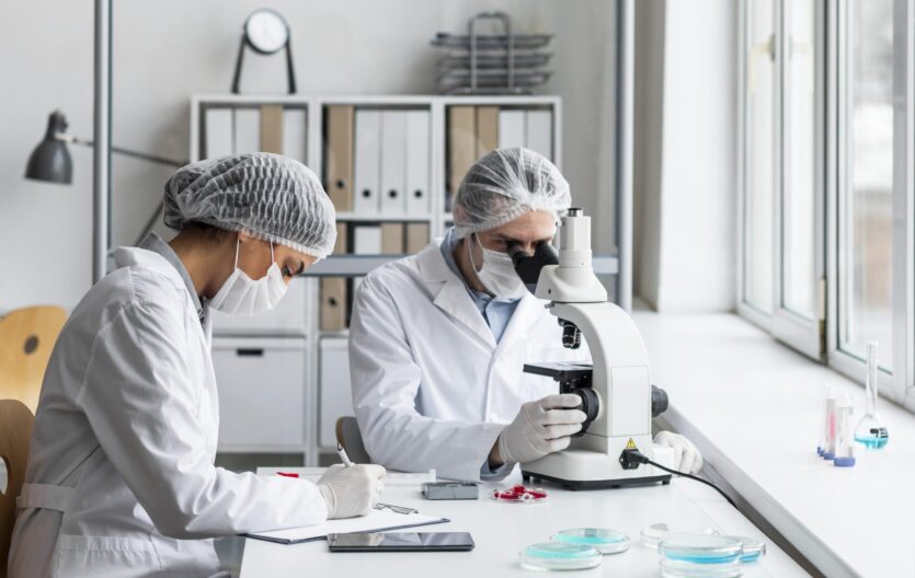 medium-shot-scientists-laboratory